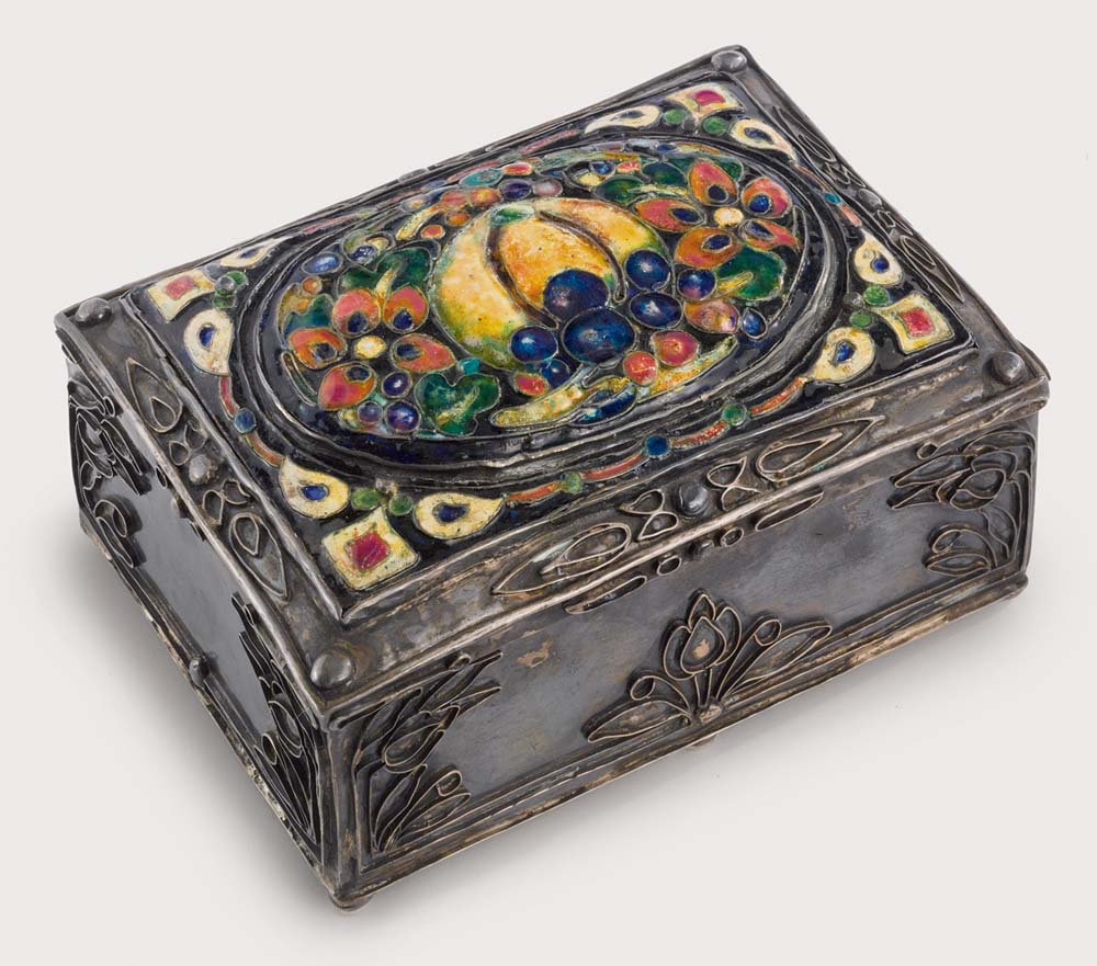 Silver box with foliate decoration and enameled lid. 3¾ x 7½ x 5¼ in., C. 1910-1937. Elizabeth S. Copeland
