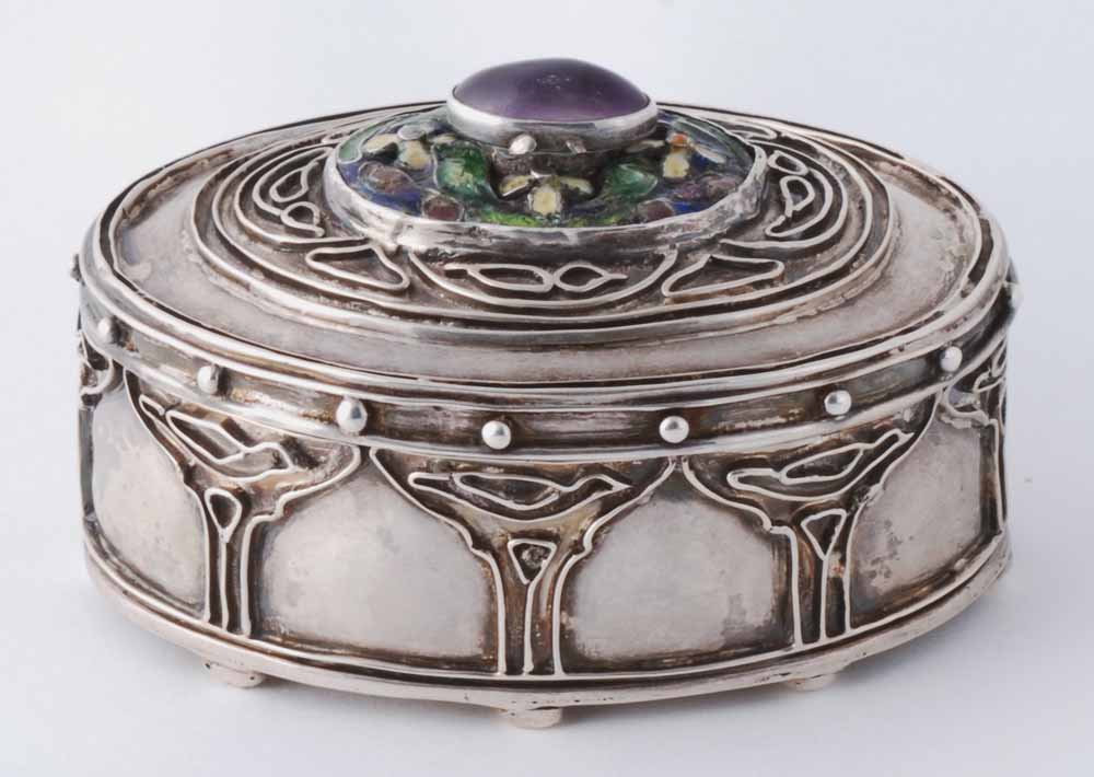 Oval hinged box. Silver, enamel, amethyst, silver wirework, semiprecious stones. 2¾ x 4½ x 3¼, 1918, Elizabeth S. Copeland