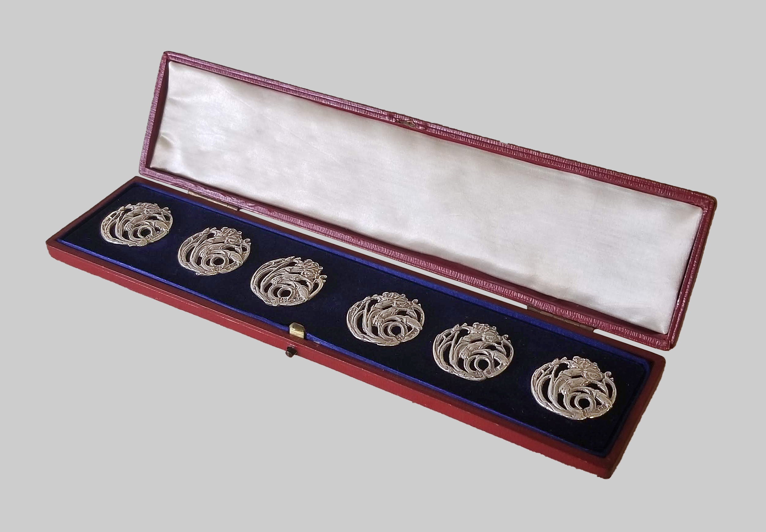 Fig. 5a - James Deakin & Sons Ltd., Buttons with carnations, 1901, sterling silver, TRRF Collection.