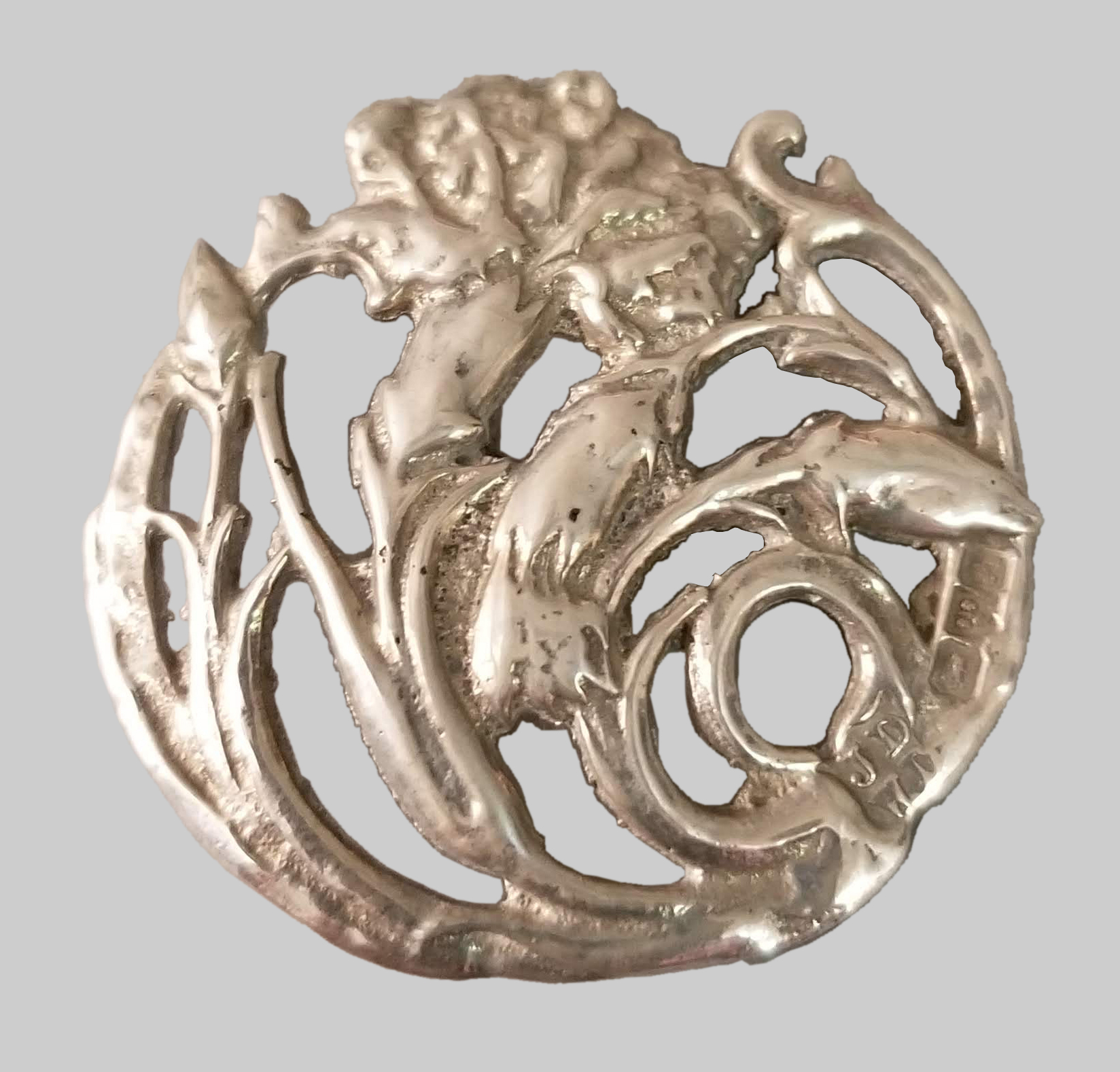 Fig. 5b - James Deakin & Sons Ltd., Buttons with carnations, 1901, sterling silver, TRRF Collection.