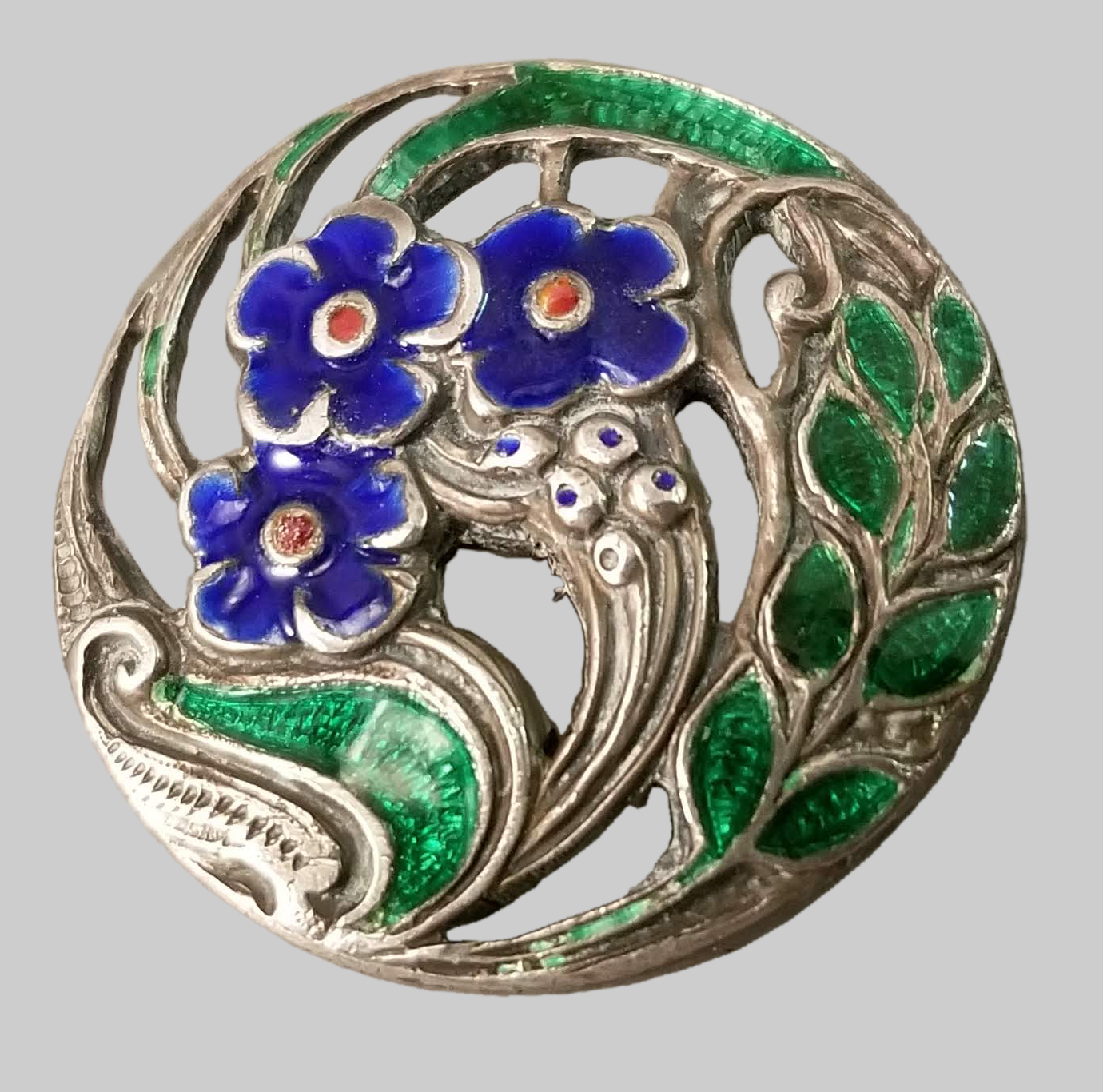 Fig. 4a - Harry Synyer and Charles Joseph Beddoes, Buttons with Forget-me-nots, 1900, sterling silver and enamel, TRRF Collection.