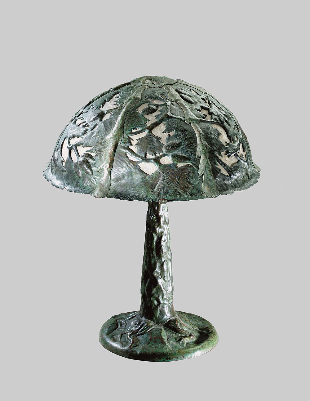 Fig. 3 - Elizabeth Eaton Burton, Lamp with pine trees, c. 1904-1910, patinated brass and shell, TRRF Collection.