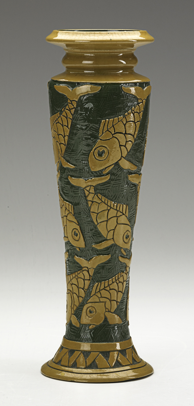 Fig. 1 - Roseville Sgraffito vase covered with fish.